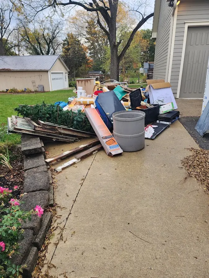Dumpster being loaded with debris for Demolition Dumpster Rental in Fort Belvoir